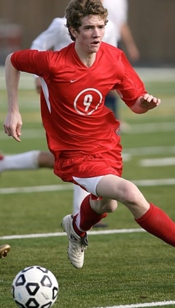image of man playing soccer
